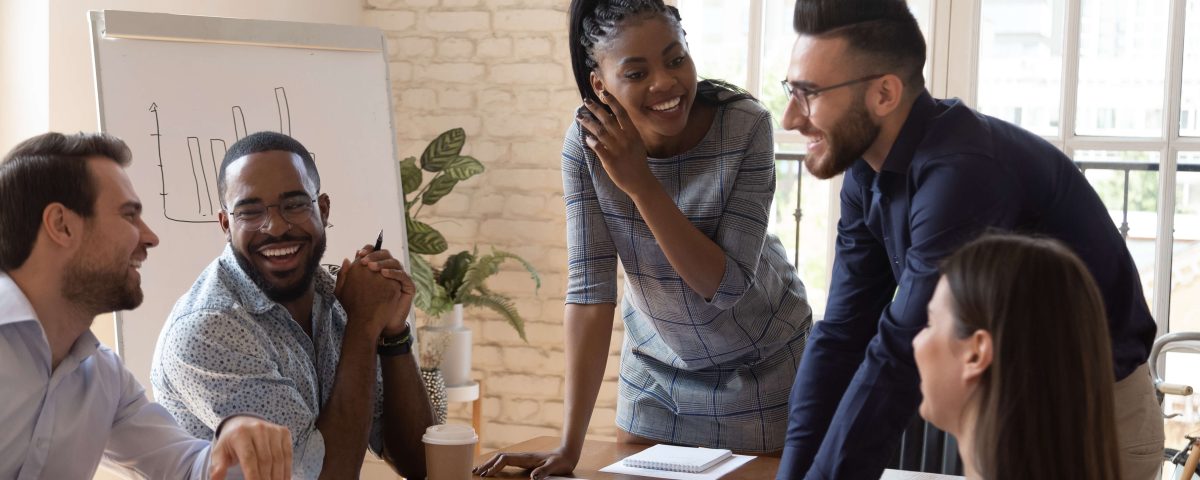 Sales team in a workshop learning practical sales strategies