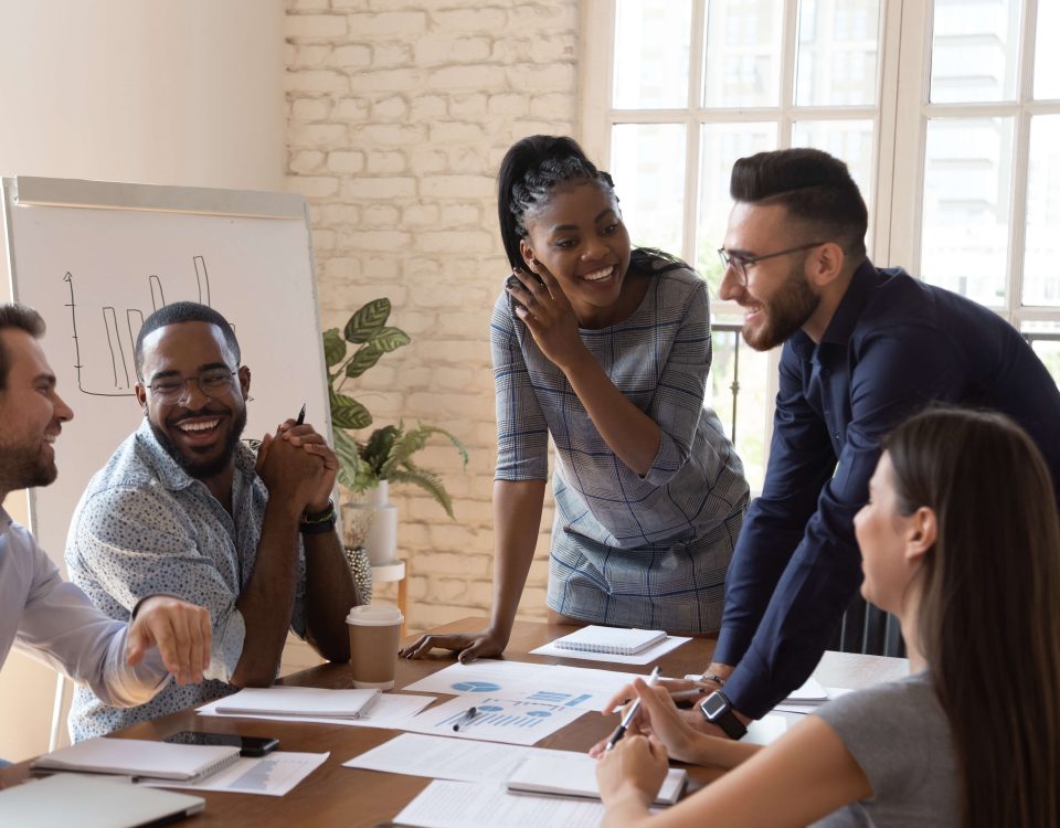 Sales team in a workshop learning practical sales strategies