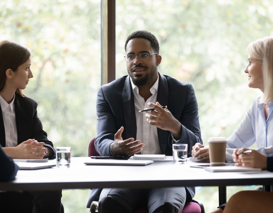 Trainer delivering sales workshop to UK business team