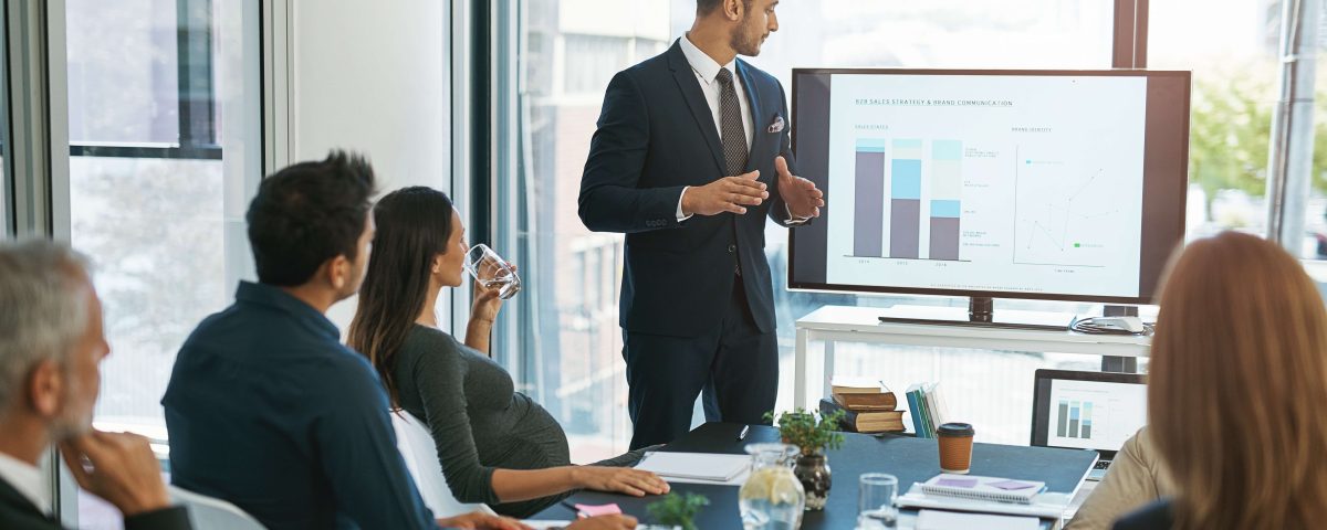 Sales team improving performance during a professional training session